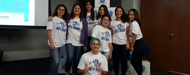 Students pose for a picture during the 'Day of Service' gathering