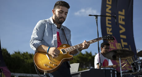Guitarist playing at a music festival