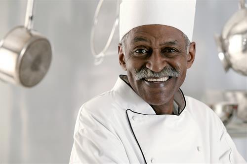 Senior male in chef’s uniform