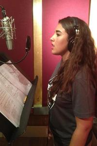 Bianca Sirgany-Castro at microphone
