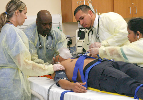 Doctors tending to patient