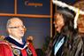 President Padrón congratulates an excited student.