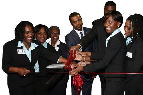 People cutting ribbon
