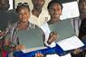 Haitian teachers holding certificates