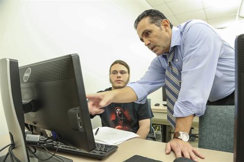 Nelson Massad with a student