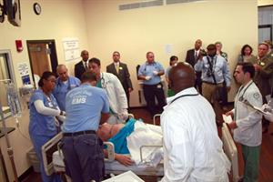 Students working with patient simulator