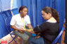 Student checks a patient's blood pressure