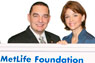 Dr. José A Vicente and Helen Aguirre Ferré with a MetLife Foundation check