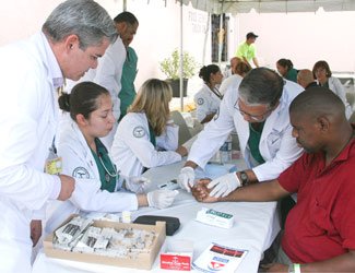 Professors supervise while Physician Assistant students provide clinical care.