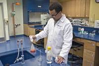 Student Mitch Rodríguez in the laboratory