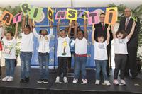 Students unveiling preschool name