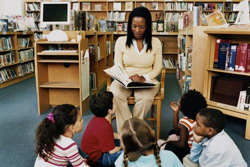 Teacher reading to students