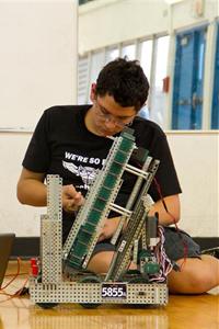 Student working on robot