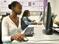 Female student at a computer Female student at a computer