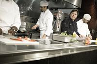 Chefs in MCI kitchen