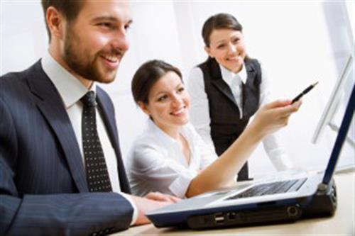 People in front of computer