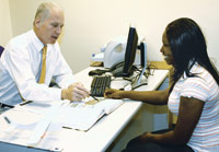 Professor Tim Schmelzer instructs a student