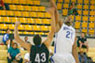 The Sharks men's basketball team at play