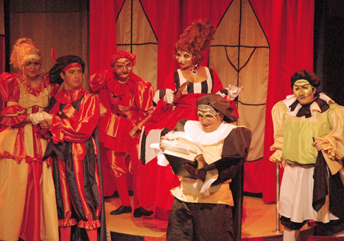 Actors wearing masks and costumes