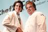 Student shaking hands with Chef John Richards
