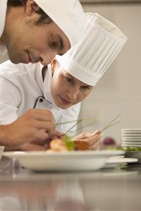 Students plating a dish
