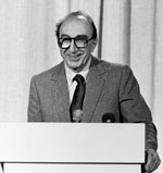 Dr. Michael DeBakey speaking from a podium Dr. Michael DeBakey speaking from a podium