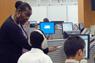 Students and teacher in computer lab