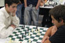 Two high school students concentrate during a tournament match.