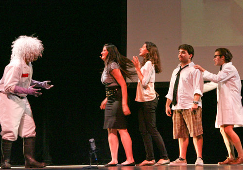 Students perform a skit in costume