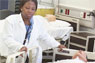 Nursing student pushes stretcher