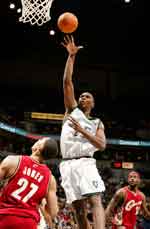 Al Jefferson scores on the basketball court Al Jefferson scores on the basketball court