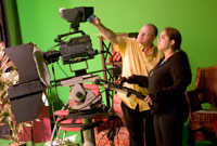 A professor explains something to a student in the MDCTV studio A professor explains something to a student in the MDCTV studio