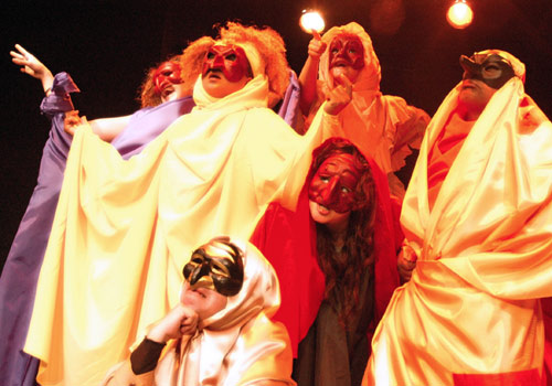 Prometeo students dressed in colorful costumes