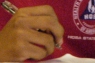 Hand with pen