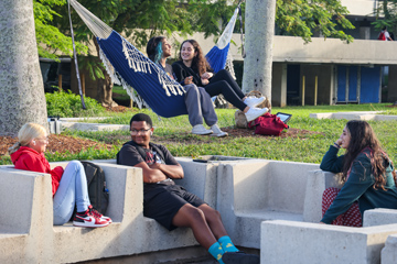 Students hanging around the courtyard at the Kendall Campus