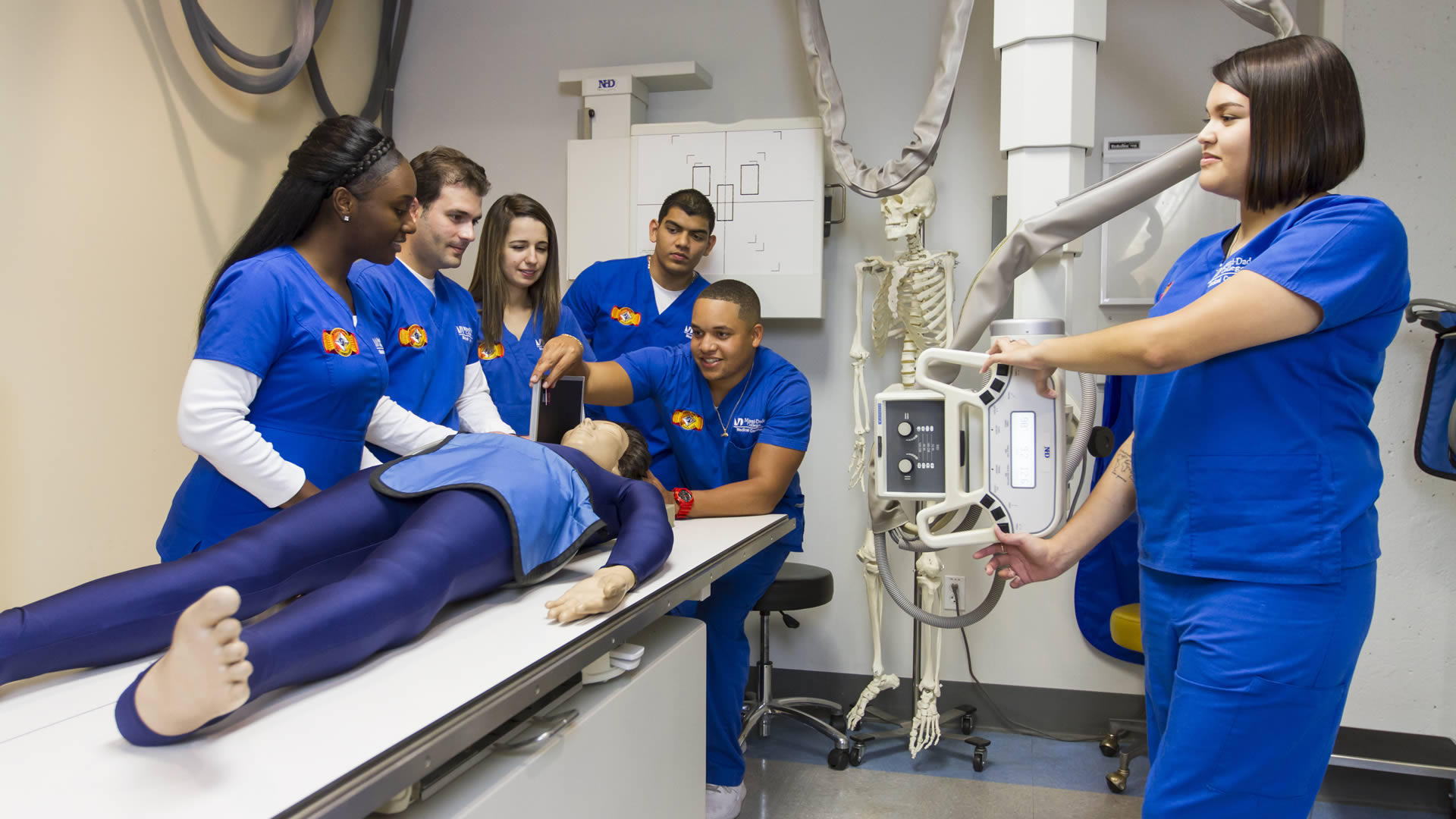 Students at the Medical Campus practice taking mock x-rays