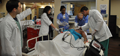 Students practice their skills in the medical lab