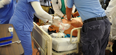 Two students practice CPR during a clinical simulation