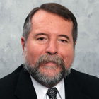 President Dr. Armando Ferrer