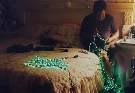 Artist Javier Cuarezma prepares green lights for art project