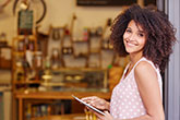Female business owner smiling