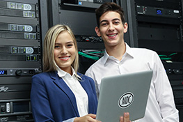 Two students in a server room