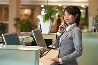 Hospitality employee on the phone