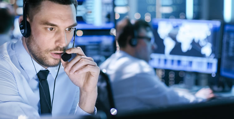 Aircraft dispatcher using headset to communicate with planes