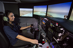 Student tarining with aviation simulation
