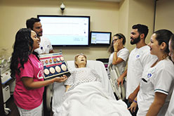 Student reading a patient chart