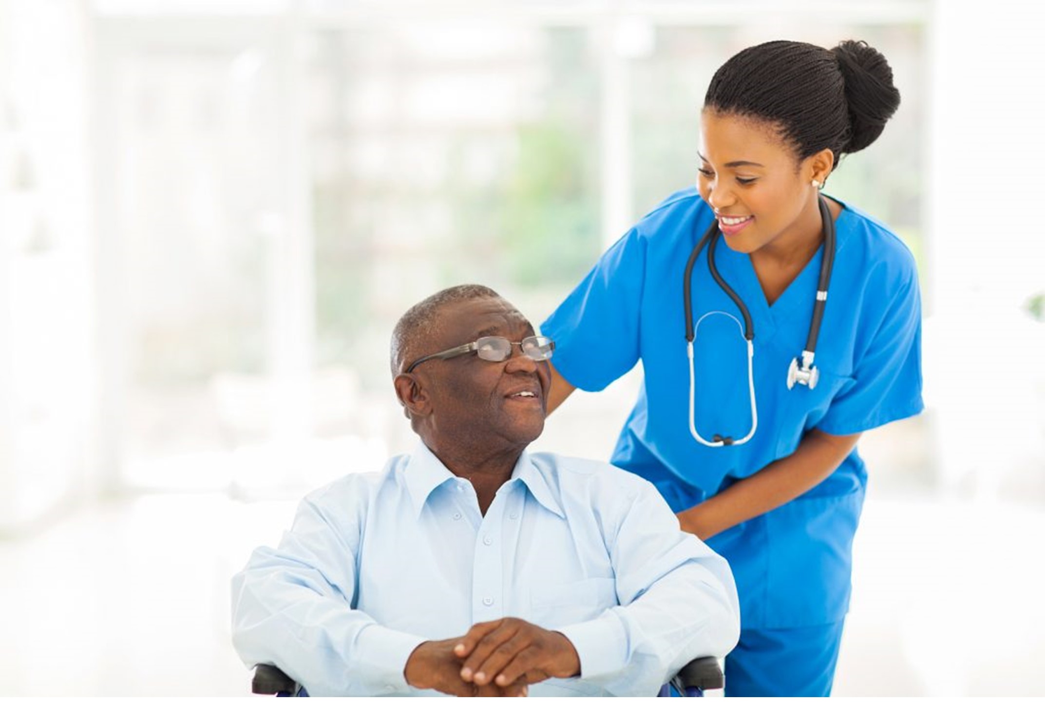 Patient in wheelchair with nurse