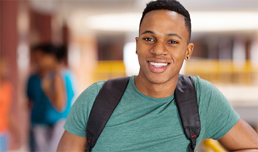 Photo of a student wearing a backpack