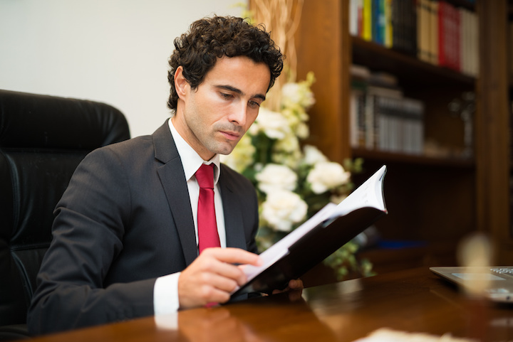 Funeral director reviewing document
