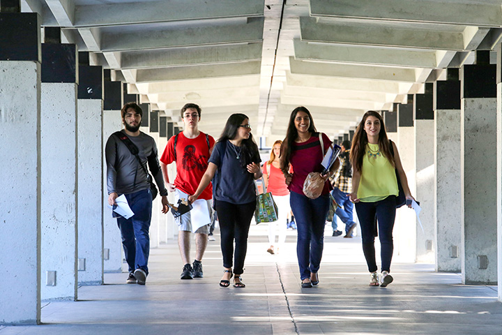 Group of students walking in hallway
